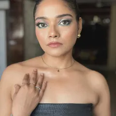 A direct look at the camera, showing the intensity and power of a well-executed smokey eye. This is a timeless look that always turns heads.