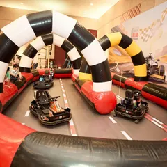 I installed a complete, inflatable go-kart track inside the venue, allowing the kids to safely race and live out their Formula 1 dreams.