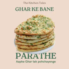 A stack of our soft, home-style parathas. We make them fresh to order, perfect for pairing with any of our sabzis or just enjoying with a side of chutney. This is a staple that carries our family's legacy.