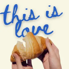 This is love. A simple, pure butter croissant being pulled apart to show its soft, airy interior. It’s a testament to the beauty of classic baking.