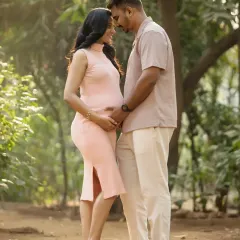 A beautiful moment of connection, with your foreheads touching. Outdoor sessions like this allow for intimate portraits that feel both grand and personal.