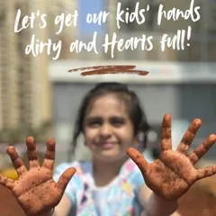 A joyful shot of a young girl showing off her dirt-covered hands. I love creating garden experiences that fill kids' hearts with joy and ignite a lifelong passion for nature.