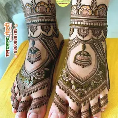 A beautiful bridal foot design featuring a central dome motif. The intricate net pattern on the toes and detailed ankle work make this a stunning choice.
