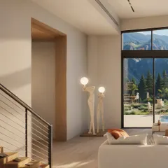 Sculptural lighting and art pieces add a touch of modern sophistication to the otherwise minimal and nature-inspired design of the Kangra holiday home.