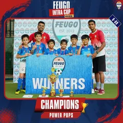 The U-9 Champions, 'Power Pups', celebrating their victory at the Feugo Intra Cup.