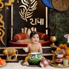 A happy little Krishna with his pot of butter. Capturing these playful expressions is what makes themed shoots so much fun.
