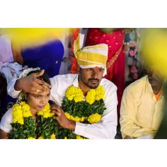 A candid moment during the wedding ceremony. The groom blesses his bride, a quiet and meaningful gesture that I love to capture. These are the unposed moments that tell the real story of your day.
