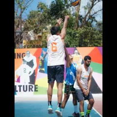 Taking a jump shot during the 3x3 Baseline Hoops tournament. Proper shooting form is a fundamental I drill into every player.