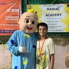 All smiles and cheers with a friendly mascot at "The Carnival." Our events are about bringing the community together for fun and basketball.