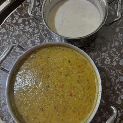 A comforting meal of Dal Khichdi and Raita, specially prepared for toddlers with mild spices and a soft consistency.
