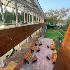 A view from the upper tier, showing the two levels of our driving range and the comfortable seating area for friends and family.