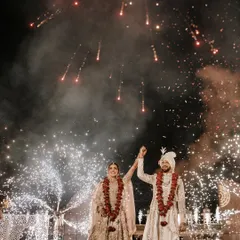 Against the backdrop of a royal palace, the sky erupts in celebration as the couple exchanges their vows. This is a signature Dark Horse moment, where we blend pyrotechnics and grandeur to make your union feel like a historical event.