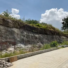 Our design process is deeply connected to the site's context. Here is the natural rock quarry located next to one of our projects, which served as direct inspiration for an interior feature.
