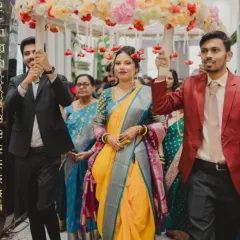 The grand bridal entry. This makeup is designed to be flawless and radiant, ensuring the bride is the center of attention as she walks in under the 'phoolon ki chadar'.