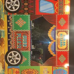 This is a photo booth frame I designed with a colorful Punjabi truck art theme. It includes fun phrases and traditional patterns, making it a unique and interactive element for guests at a Mehendi or Sangeet event.