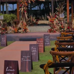 I believe the journey to the altar should be meaningful. These custom-designed aisle signs feature quotes that are special to the couple, making their wedding procession even more personal.