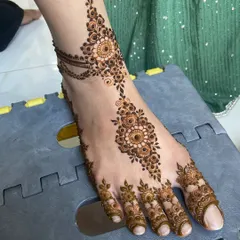 A close-up of the foot design, showing the clean lines and jewelry-like ankle chain.