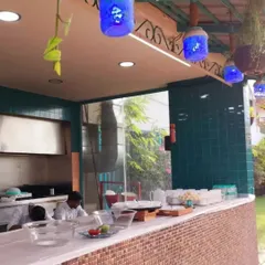 A live counter setup for a birthday celebration in a home. We can create a functional and attractive cooking station even in smaller spaces.