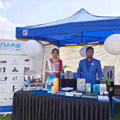 Our team at the NAMO HiFi stall during the Brigade School Annual Day Event. We set up these displays to give the community a chance to interact with the latest smart home automation products.