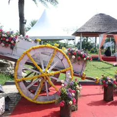 A daytime view of the rustic floral cart, highlighting the fresh flowers and handcrafted details in natural light.
