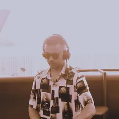 A candid shot from a daytime set. Even in a more relaxed environment, I'm completely focused on delivering the perfect soundtrack for the occasion.