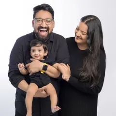 A joyful family of three, captured in a moment of pure happiness. Our studio portraits are perfect for creating timeless images that you'll cherish forever.