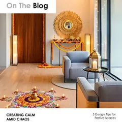 A blog post on creating calm amid festive chaos. This image from a decorated entryway illustrates how simple touches like flowers, candles, and soft lighting can create a serene and welcoming atmosphere.