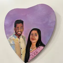 The completed heart-shaped canvas portrait for a wonderful and ambitious couple. It was an honor to create this piece for them as a thank you for their constant support.