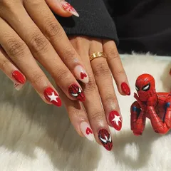 Another shot of the amazing Spiderman nail set. The combination of detailed character art with bold red and graphic stars creates a powerful, eye-catching look.