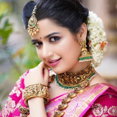 Another beautiful shot of Ashika Ranganath, this one capturing a gentle, candid smile. These are the moments I look for to bring life to a portrait.