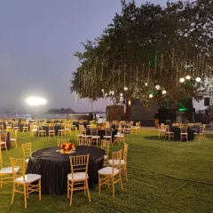 An evening view of a large-scale outdoor event we catered. We handle everything from the menu to the setup, ensuring a seamless experience for hundreds of guests, as seen here at the Belgian King's Day celebration.