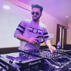 Focused behind the decks. Every event gets my full attention as I carefully select and mix tracks to build the perfect vibe from start to finish.