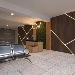 The first impression matters. This is a 3D render of a reception and waiting area we designed, featuring a green wall, modern lighting, and geometric wall patterns to create a welcoming and professional entry point for a business.
