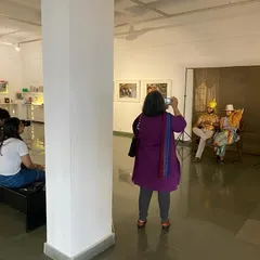 An interactive moment from Clare Arni's 'Southern Stars' exhibition. I love creating shows where visitors are not just viewers but participants. Here, guests could dress up in costumes and become part of a photo studio setup, making their own memories within the exhibition.
