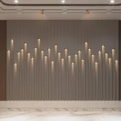 This feature wall was designed for the perfume boutique to create a unique sensory experience. The fluted paneling with candle-like lights creates a visually stunning backdrop that enhances the theme of luxury fragrances.