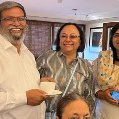 Sharing a cup of tea and a smile with women members of the bar. These informal interactions are just as important as formal meetings for understanding the needs of our community.