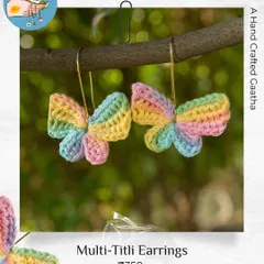 My bestselling multi-color 'Titli' earrings, hanging out in nature. These are handmade to be as light and fluttery as a real butterfly.