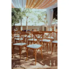 The ceremony seating arranged under the shade of mango trees, creating a natural and beautiful setting for this intimate wedding.