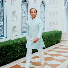 The full look of the pastel blue bundi set, showing its clean lines and comfortable fit, perfect for a long day of wedding festivities.