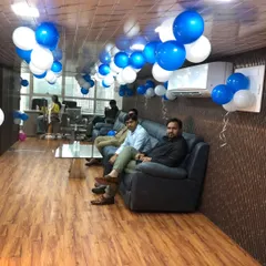 The lounge and seating area were also part of the inauguration decor. Blue and white balloons on the ceiling and walls maintained the festive atmosphere throughout the office.