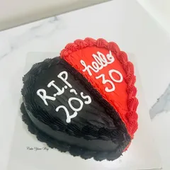 Out with the 20s, in with the 30s. A fun, split-heart cake to say goodbye to one decade and hello to the next.