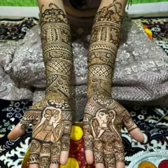 A full view of the bride and groom portrait design, extending all the way to the elbows. I've filled the arms with detailed traditional patterns to complement the central figures on the palms.