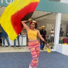 Bringing the colors of JoyTown to life at the BMW India event. Performing at festivals like this allows me to share my passion with a wider audience.