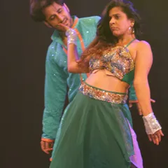 A playful moment during a couple's sangeet dance. My choreography isn't just about steps; it's about expressing your personality as a couple, whether it's romantic, fun, or a little bit of both.