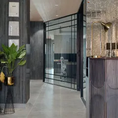 Step into the future of work with this electrifying office design. I used dark wood paneling, glass partitions, and modern furniture to create a space that is sophisticated, dynamic, and inspiring.
