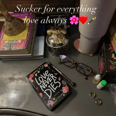 This is my reminder that it's okay to lean into small comforts when you're feeling overwhelmed. Sometimes sitting with your emotions means surrounding yourself with things you love, like a good book.