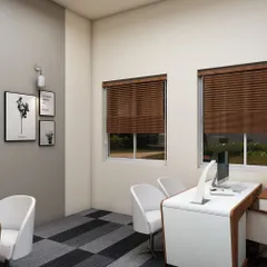 A 3D visualization of a small consultation or meeting nook. This render allows the client to see exactly how the furniture fits, how the lighting works, and how the overall space will feel before any work begins.