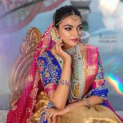 For a more modern take on the half-saree look, I offer fusion jewelry sets. This combination of a diamond-simulant choker and a long green beaded haram creates a stylish and unique look that stands out.