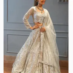 Get ready to sparkle all night. Our full-flare silver sequin lehenga is a bestseller for a reason, perfect for any sangeet, cocktail night, or reception.