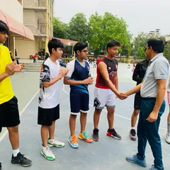 Shaking hands with each player to acknowledge their hard work and dedication.